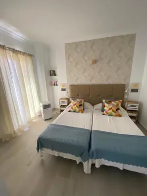 Cama o camas de una habitación en Arguineguín Faroe
