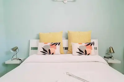 Cama o camas de una habitación en Vivienda Vacacional Hábitat Tropical