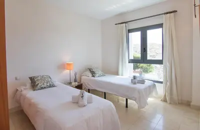Cama o camas de una habitación en HomeForGuest SALOBRE GOLF VILLA, POOL, BBQ, WIFI, STUNNING VIEWS
