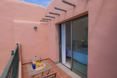 Un balcón o terraza de HomeForGuest SALOBRE GOLF VILLA, POOL, BBQ, WIFI, STUNNING VIEWS