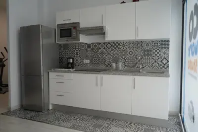 Una cocina o zona de cocina en Coworking Studio