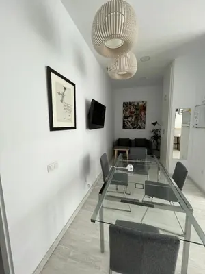 Una televisión o centro de entretenimiento en Coworking Studio