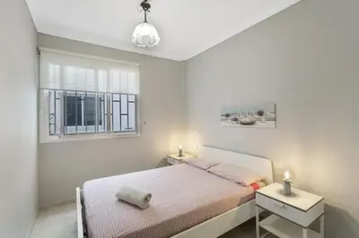 Cama o camas de una habitación en Spacious apartment in Las Palmas de Gran Canaria - 85 m² with WiFi