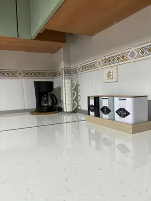 Una cocina o zona de cocina en APARTAMENT SARDINA NEAR THE BEACH WITH POOL AND WIFI e