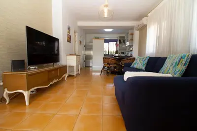 Una televisión o centro de entretenimiento en Sea View Meloneras Terrace Duplex +Wifi +Barbecue