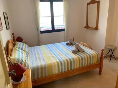 Cama o camas de una habitación en Vivienda Agaete Paradise