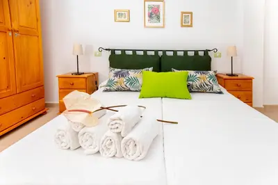 Cama o camas de una habitación en Elisabeth Vacacional La Palmita