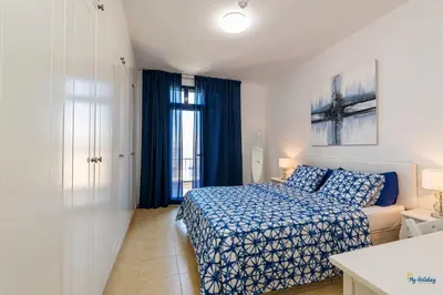 Cama o camas de una habitación en Bahía Meloneras Fase II
