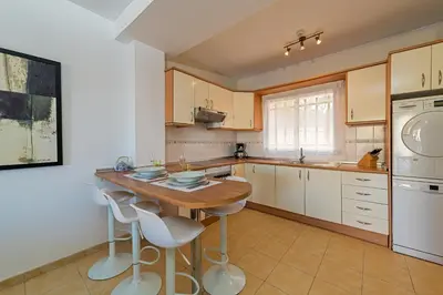 Una cocina o zona de cocina en Bahía Meloneras Fase II