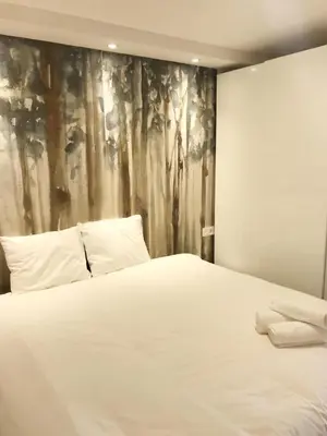 Cama o camas de una habitación en JUST To SLEEP 2 BEDROOMS APARTMENTS