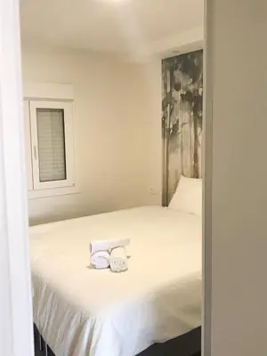 Cama o camas de una habitación en JUST To SLEEP 2 BEDROOMS APARTMENTS