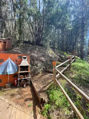 Jardín al aire libre en Casa Rural en medio del bosque, El Lance