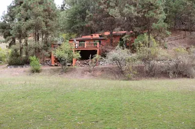 Jardín al aire libre en Casa Rural en medio del bosque, El Lance