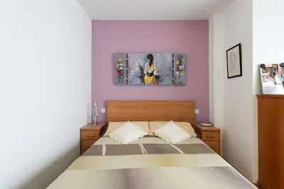 Cama o camas de una habitación en Aurora Beach Apartment