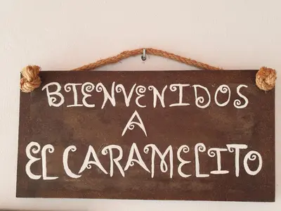 Certificado, premio, señal o documento que está expuesto en El Caramelito 1