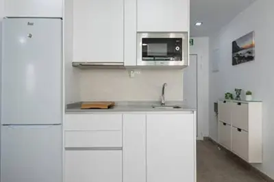 Una cocina o zona de cocina en Comfortable and cozy