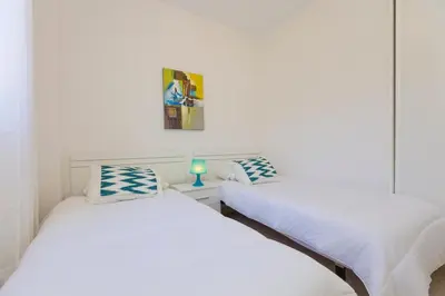 Cama o camas de una habitación en Apartamento Jumilla Vista Mar 23