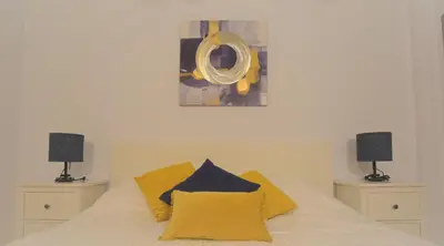 Cama o camas de una habitación en Suite Ribera del Puerto
