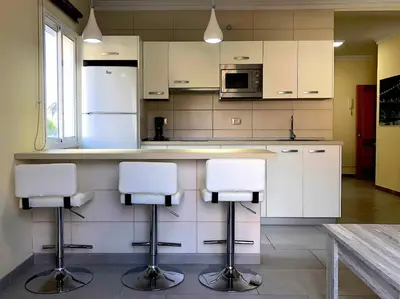 Una cocina o zona de cocina en Apartamentos La Puntilla Mogan