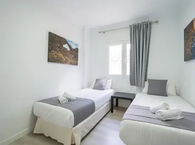 Cama o camas de una habitación en Penthouse Terrace city-sea view by CanariasGeytaway