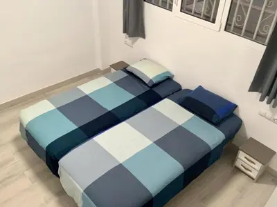 Cama o camas de una habitación en Calm, Cosy and Bright apartment renovated in playa del ingles- WiFi free
