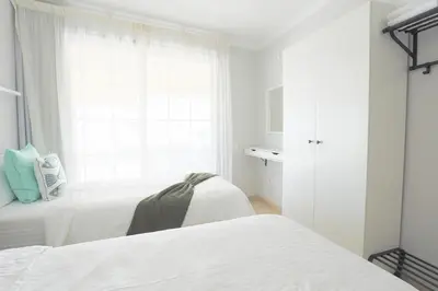 Cama o camas de una habitación en HD Mogan Beach Apartment