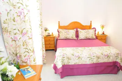Cama o camas de una habitación en EmyCanarias Holiday Homes Vecindario