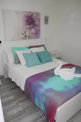 Cama o camas de una habitación en Solymar Las Olas