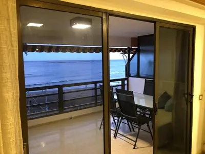 Un balcón o terraza de Espectacular en primera línea de la playa