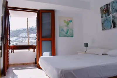 Cama o camas de una habitación en Bungalow Guayana