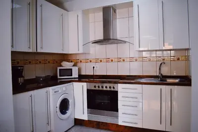 Una cocina o zona de cocina en Bungalow Guayana