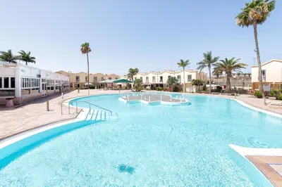 Piscina en o cerca de DUPLEX en PARAÍSO