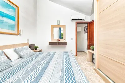 Cama o camas de una habitación en DUPLEX en PARAÍSO
