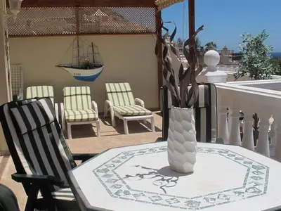 Un balcón o terraza de Playa De Mogan Mirador 8 by El Sirocco