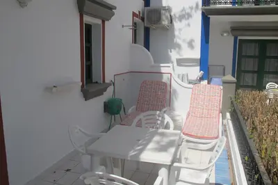 Zona de estar de Harbour n 233 Playa de Mogan by El Sirocco