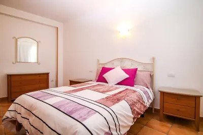 Cama o camas de una habitación en VVROMPEOLAS
