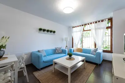 Zona de estar de Bungalow next to the Beach