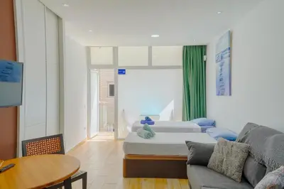 Cama o camas de una habitación en VV 404 Vista Mar con Balcón