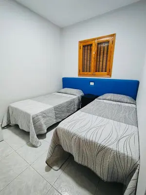 Cama o camas de una habitación en TABLERO 402, ESTUPENDO Apto 8 pax cerca PLAYA DEL INGLÉS