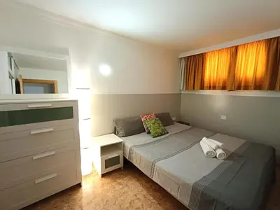 Cama o camas de una habitación en in the heart of Playa del Inglés