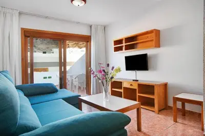 Una televisión o centro de entretenimiento en Montecarlo Apartamento10