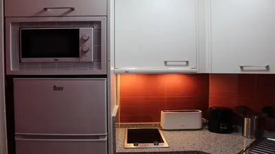 Una cocina o zona de cocina en Marlenghi Apartments View Canteras