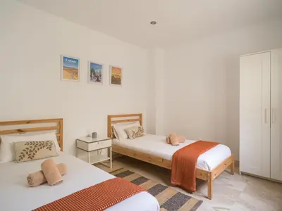 Cama o camas de una habitación en Awesome beachfront terrace By CanariasGetaway