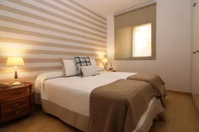 Cama o camas de una habitación en Bahía Meloneras II 5