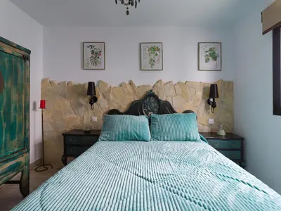 Cama o camas de una habitación en Viviendas vacacionales San Mateo