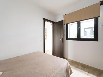 Cama o camas de una habitación en Viviendas vacacionales San Mateo