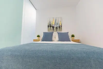 Cama o camas de una habitación en Apartamento Luis Morote Plaza Santa Catalina