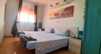 Cama o camas de una habitación en 5 minutes close by Playa del Inglés-1&2BR aptm with view & private terrace for 2 persons