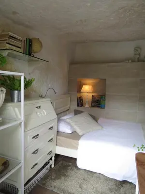 Cama o camas de una habitación en La cueva de Ángel B&B