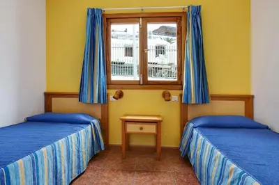 Cama o camas de una habitación en CityHub Vacational Home Puerto Rico Montecarlo 11